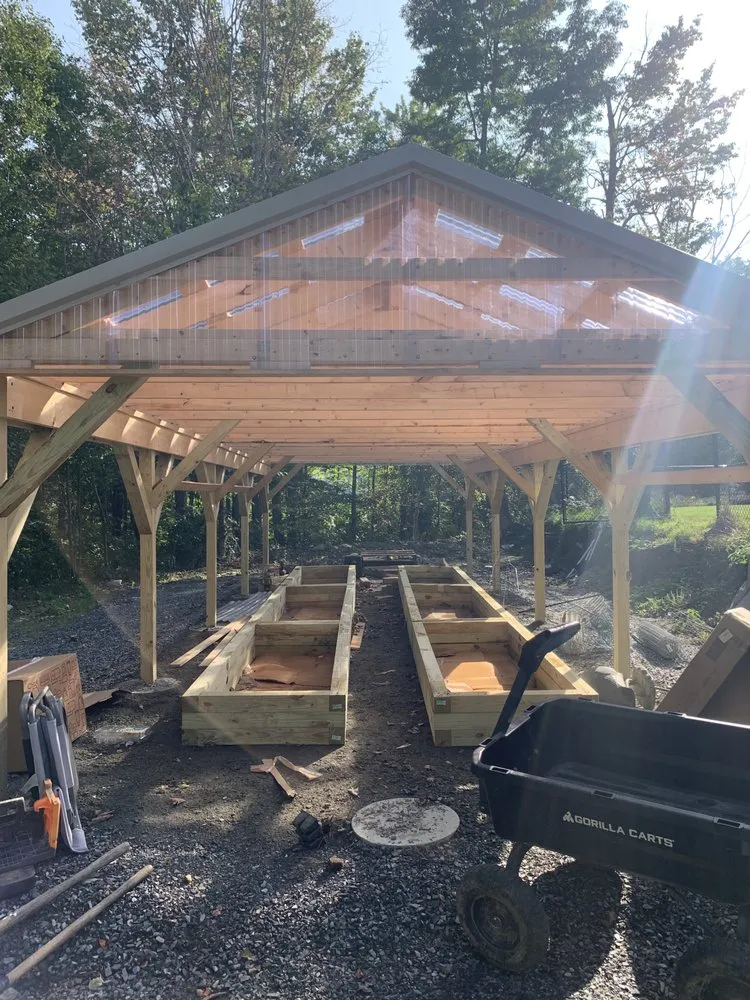 Professional landscape design for residential properties in Lewiston, ME by Your Main Helpers