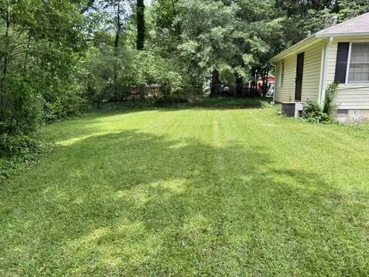 Yustin R General Contractor Logo