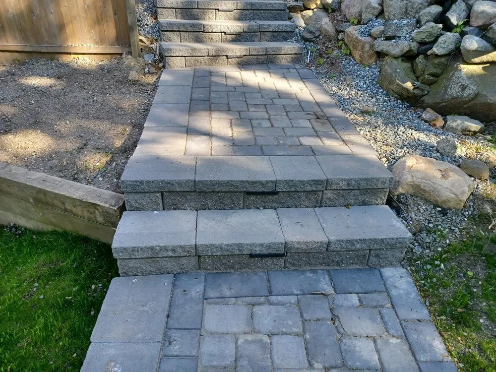 Custom landscape installation in Lynn, MA by Zacarias Tree & Landscaping