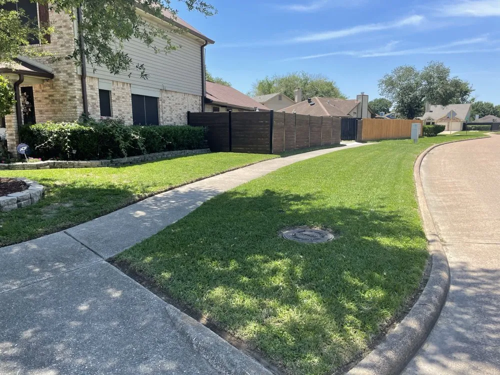 Local yard cleanup service for homes in Houston, TX by Zachary Scott Lawn Service