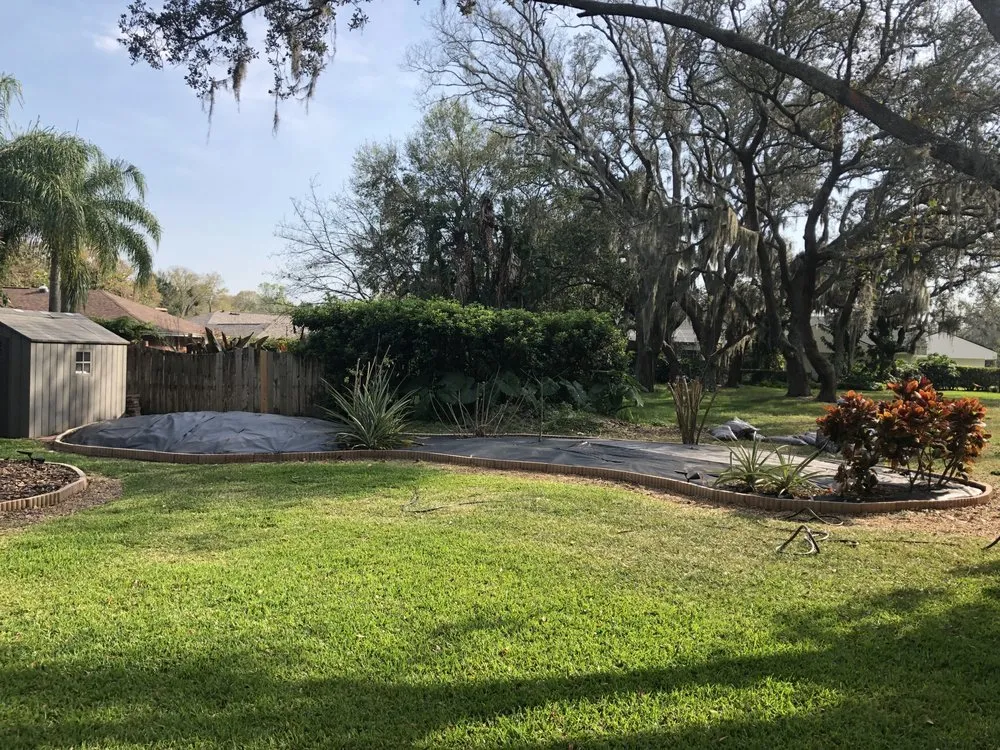 Affordable landscape design with custom design in Carrollwood, FL by Zacks Lawn Care