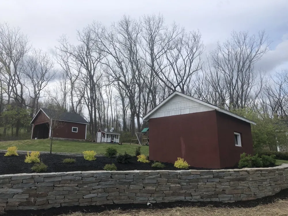 Professional residential landscaping for year-round maintenance across Manalapan, NJ - Zadlock Outdoor Services