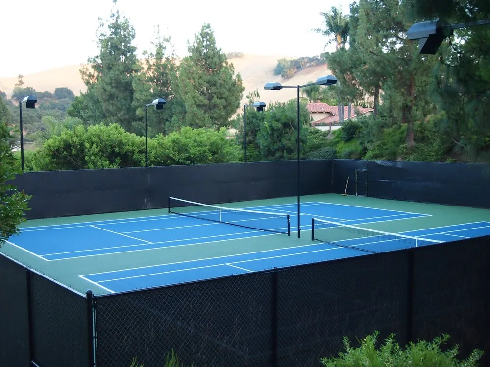 Trusted lawn mowing service for year-round maintenance in Orange, CA by Zaino Tennis Courts, Inc.