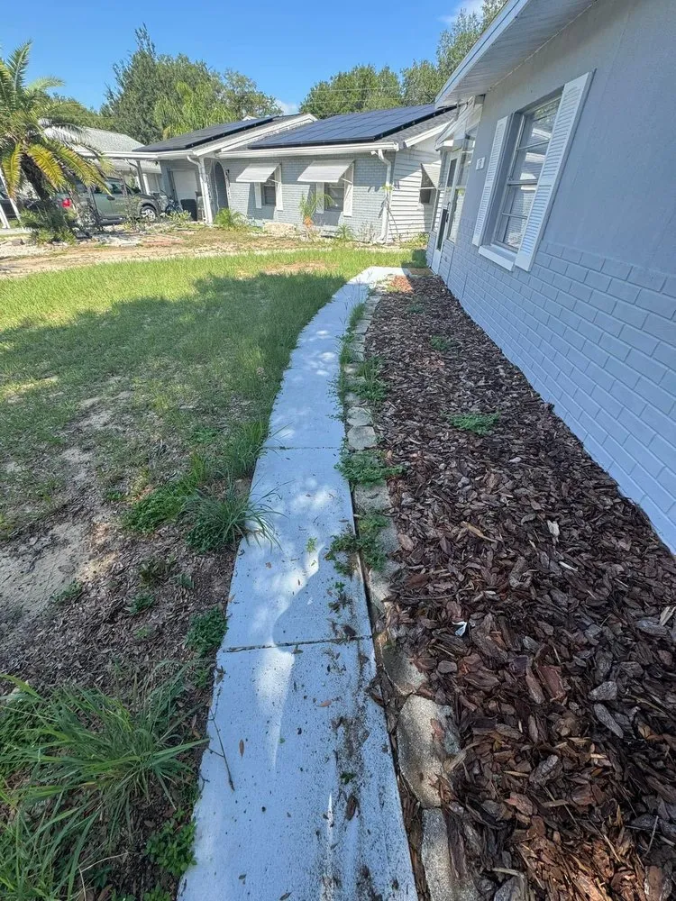 Professional yard cleanup service for residential properties in Haines City, FL by Zambrana Lawn Care