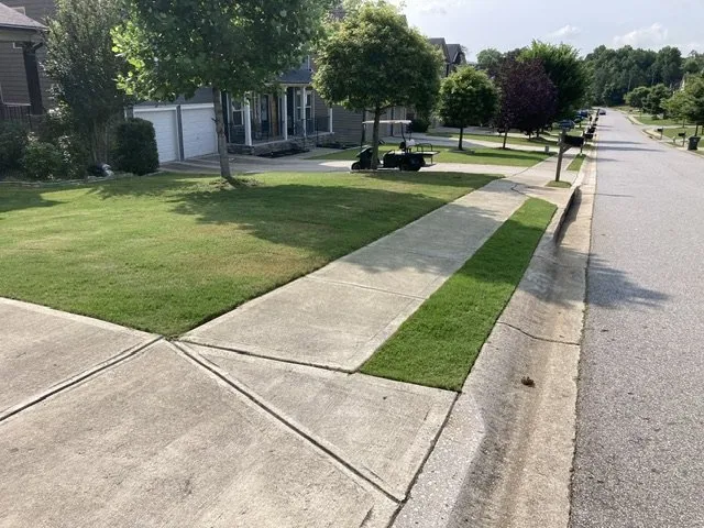 Custom lawn mowing service for year-round maintenance in Cumming, GA by Ziba Landscaping
