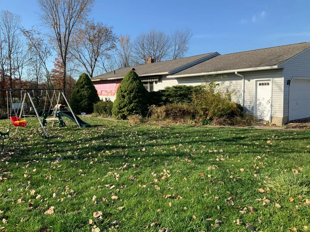 Custom lawn mowing service for homes in Painesville, OH by Zion Artisan