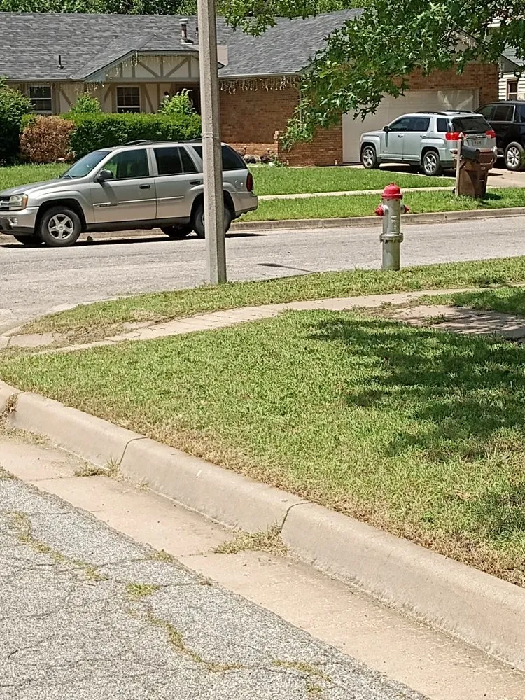 Professional residential landscaping with custom design across Wichita, KS - Zips Grass and Gutters